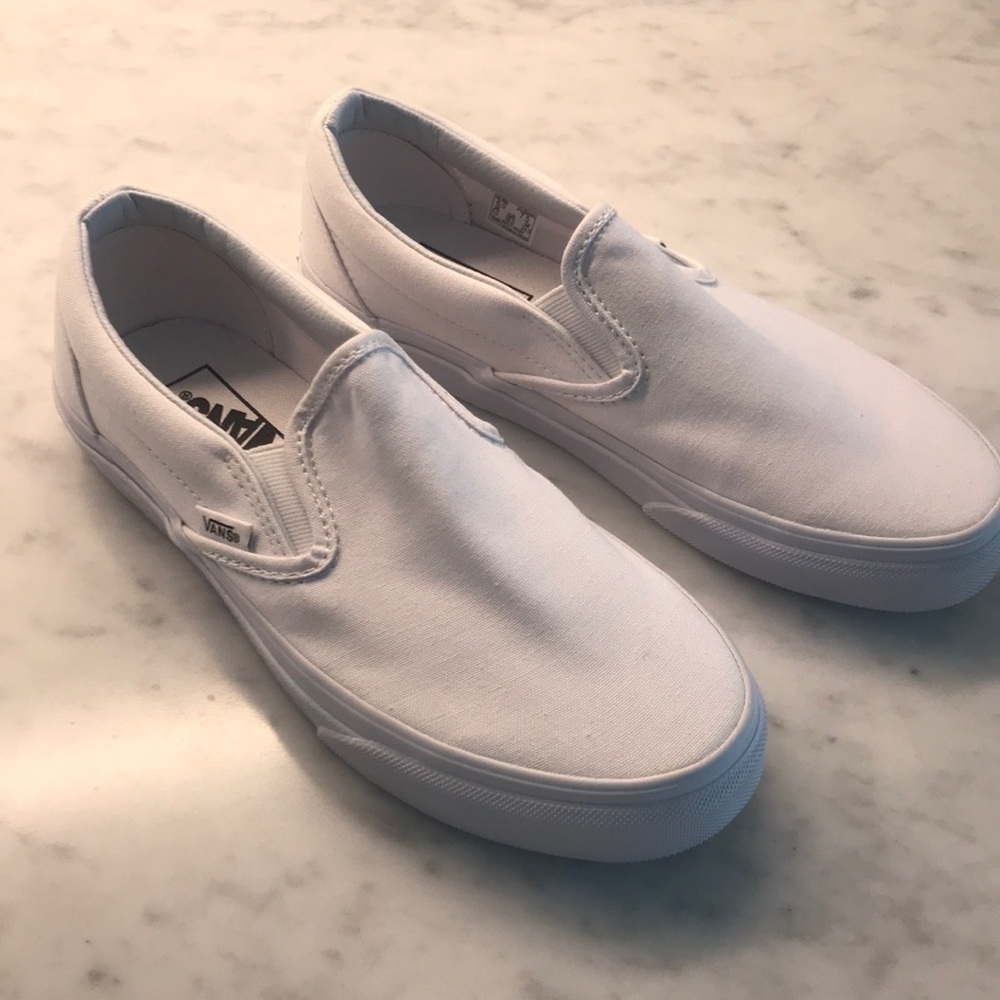 Vans white slip ones